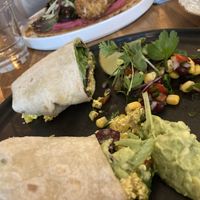 Burritos with „crumbled egg“ and guacamole (vegan)  at Little Dancer in Linz