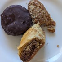 Sweets: wagon wheel (GF), cookie (partially eaten) and baklava at Staazi & Co in Adelaide