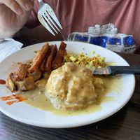 Biscuits and gravy with tempeh bacon   at Vertical Diner and The Gold Room in Portland