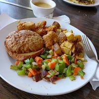 Chikun and biscuit with gravy on the side. at Vertical Diner and The Gold Room in Portland
