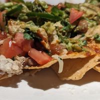 Vegan nachos with vegan cheese at Yard House - Battery Ave in Atlanta