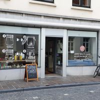 front of shop at KarmaMarkt in Bruges