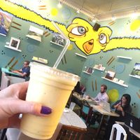 mango colada - mango, pineapple, banana, coconut milk (vegan) at Delicious Cafe in Chicago