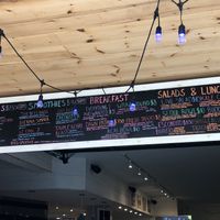 Menu. Juices, smoothies, breakfast wrap, burrito, salads, bowls, with vegan cheese, vegan sour cream, vegan Cesar. Great options. Super friendly staff at Live Cafe in Kennebunk