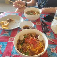 fresh egg noodles with tomato-eggplant broth and mushroom balls at Kao Man Kai Jay Vegan in Chiang Dao