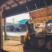 Friendly lady cooking the noodle soup  at Kao Man Kai Jay Vegan in Chiang Dao