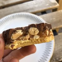 Nice caramel, chocolate nut slice  at Flax in Malmo