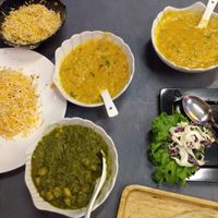 Daal, sesame basmati rice, channs with spinach, and roti at Indish in Chiang Mai
