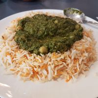 Chickpeas with spinach curry over cumin basmati rice. at Indish in Chiang Mai