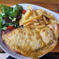 ROASTED VEGETABLE
AND PESTO TORTILLA PARCEL with extra cheese on chips at The Eating Gorilla in Penrhyndeudraeth