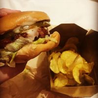 The Vegan Burger and chips (more like crisps) - soooo tasty!! at Ham Holy Burger - Brescia in Rome