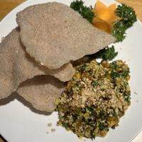 Mushroom and tofu served with a crispy pancake   at Sen Vegan House in Ho Chi Minh City