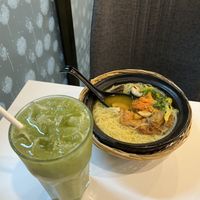 Kiwi-cucumber juice and “pumpkin soup"  at Minf Houze Vegan Cafe in Kuala Lumpur