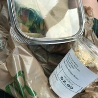 Had a hummus wrap with avocado, tomatoes, and spinach! Also these Vegan Rice Crispy Bites that were SO GOOD. at Nature's Corner Market in Marietta