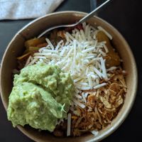 BYOB with Mexican rice, pinto beans, roasted peppers and vegan cheese. at Taqado in Abu Dhabi