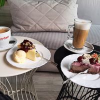 Vegan Cheesecake and Cherry Chocolate Cake w Oatmilk Latte at Portowa28 in Kolobrzeg