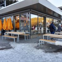 Exterior and outdoor seating at Caffe Spettacolo in Arosa