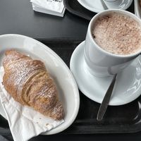 Caotina hot chocolate with soy milk and apricot filled  croissant.  at Caffe Spettacolo in St Moritz