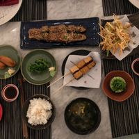Fried inari sushi, wakame sushi, miso eggplant, yasai miso soup, grilled tofu skewer, kakiage tempura, goma dofu and simple rice. at Kuu Bali in Sanur