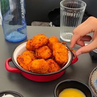 Buñuelos de boniato con chutney de mango  at Meraki in Oviedo