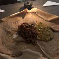 Nr. 13 and 15 with a large side of traditional sourdough bread - delicious at Ethiopisch Eethuis Sarah in Leeuwarden