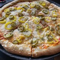 Custom vegan cheese pizza with banana peppers and jalapeños   at 816 Pint & Slice in Fort Wayne
