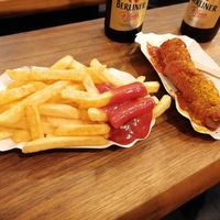Vegan Currywurst and chips at Curry 61 in Berlin