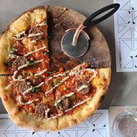 Chorizo meatball vegan pizza at Nomad Urban Eatery in Seef