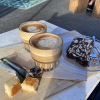 Coffee with oatmilk & vegan cake  at Grenswerk in Venlo
