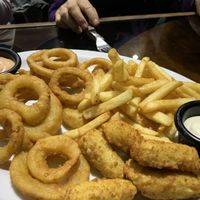 Nibbles tray - appetizer! Onion rings SO good... at Morphos in Monteverde