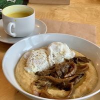 Polenta with eggs and mushrooms, golden milk  at Havana in Warsaw