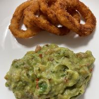 Onion rings and Guacamole. Order from home  at Plant Cafe & Kitchen - Itaewon in Seoul