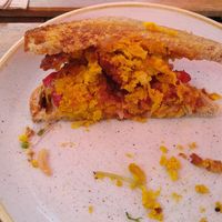 Onion Bhaji Sandwich on toasted sourdough at Grasshopper Cafe in Hope