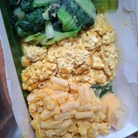 Custom combo (Mac and cheese, tofu scramble, bok choy, cucumber salad) at The Sloth in Canggu