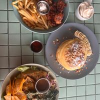 Grilled seitan bowl, chicken strips, pancakes  at The Sloth in Canggu