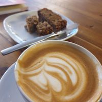 Oat milk cappuccino and delicious vegan cake at Rialto in Eyemouth