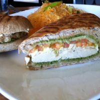Chicken pesto sandwich with kelp salad, side view. at Golden Mean in Santa Monica