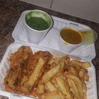 vegan battered sausage, chips, curry sauce and mushy peas ❤ at Minchella's in Sunderland
