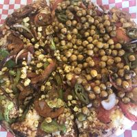 Half tandoori veg and half garbanzo beans vegan pizza  at Tasty Pizza in Cupertino
