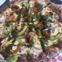 Our parents had the masala veggie vegetarian pizza  at Tasty Pizza in Cupertino