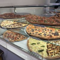At least 14-15 different vegan pizza options  at Artistic Pizza in New York City