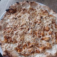 Vegan bolognese pizza at Fitagain in Krakow