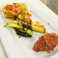Cous cous, zucchine alla menta, marmellata di cipolle e agrumi at Il Portico in Nuoro