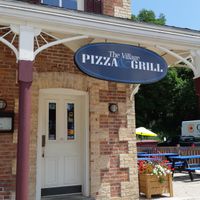 The restaurant's front at The Village Pizza and Grill in Flesherton