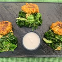 Potato and sweet corn patties with vegan mayo, served on cabbage  at Urban & Veggie in Dubrovnik