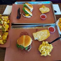 Nachos, two bacon cheeseburgers, mac and cheese, garlic bread and fries at Smokee Mo's St Louis BBQ in St Louis