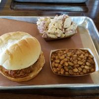 Jaxkfruit BBQ sandwich.  Vegan red potatoe salad and BBQ beans. at Smokee Mo's St Louis BBQ in St Louis