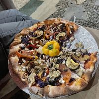 Vegan pizza without cheese and a lot of vegetables   at Pizza Yolo in Santa Catalina