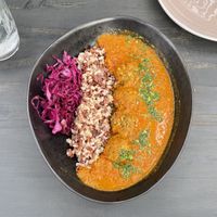 Lentils balls with brown rice in curry sauce  at Green Kukunari in Crete