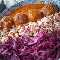 Lentil Balls with wild rice and curry sauce at Green Kukunari in Crete